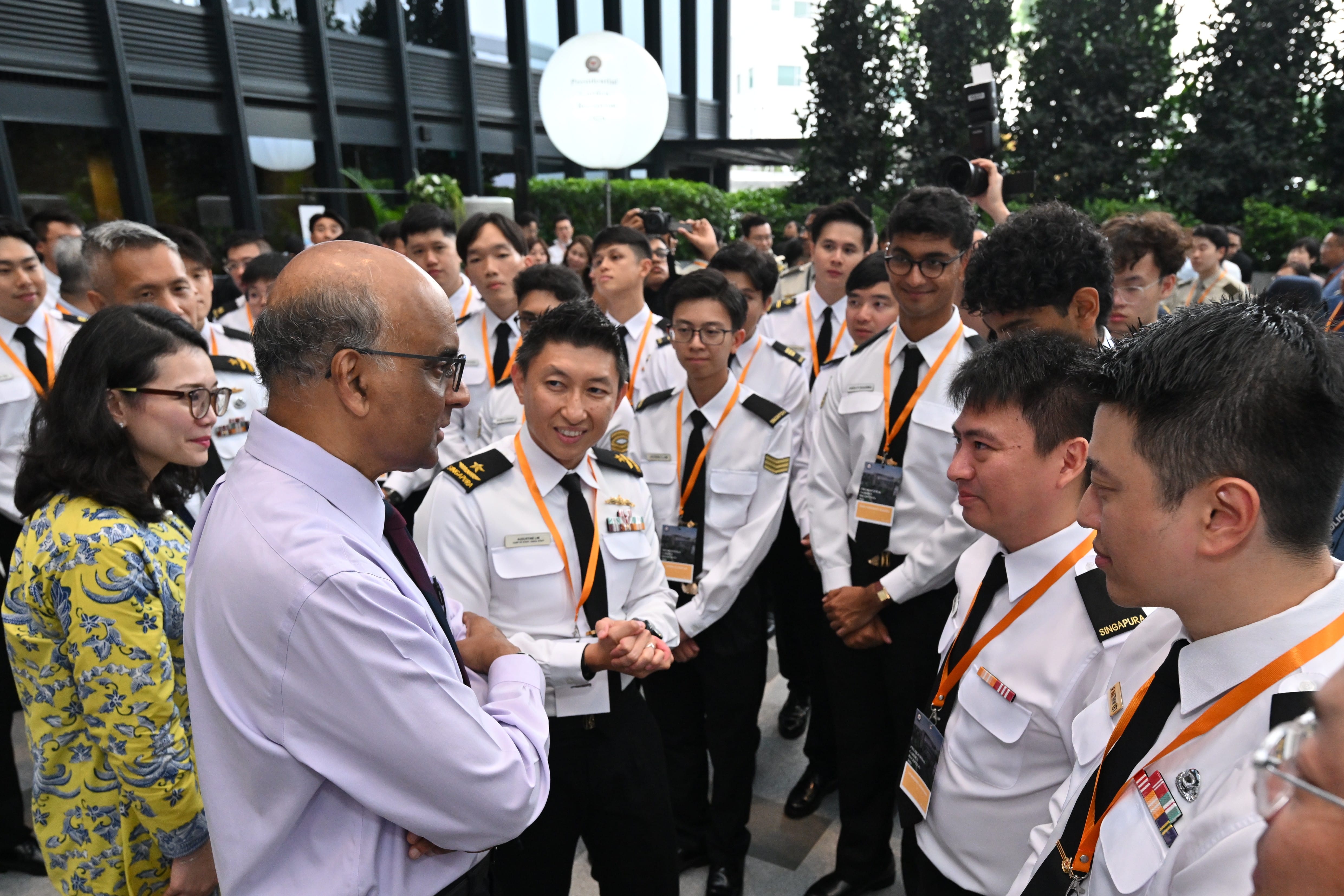 President Tharman Shanmugaratnam interacting with service personnel from the Republic of Singapore Navy.